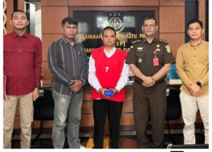 tersangka kasus dugaan korupsi Anggaran Pendapatan dan Belanja Desa (APBDes) serta setoran pajak senilai Rp 234,5 juta